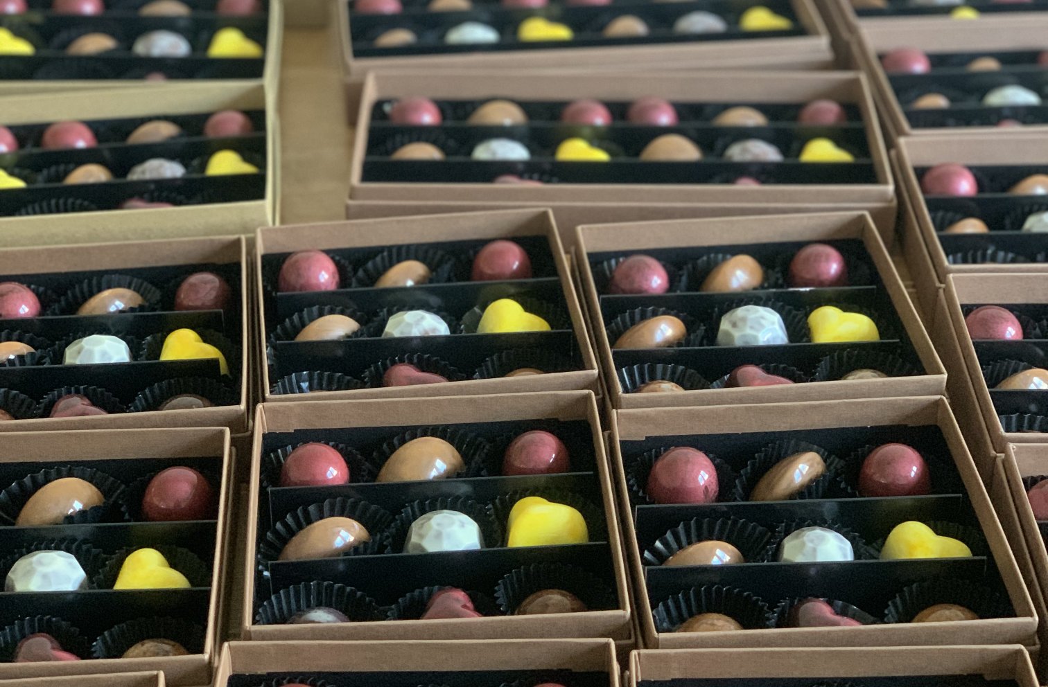 Chocolate boxes being assembled