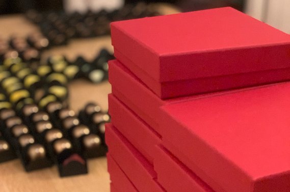 Bonbon boxes ready to go and some chocolate being prepared for the next boxes